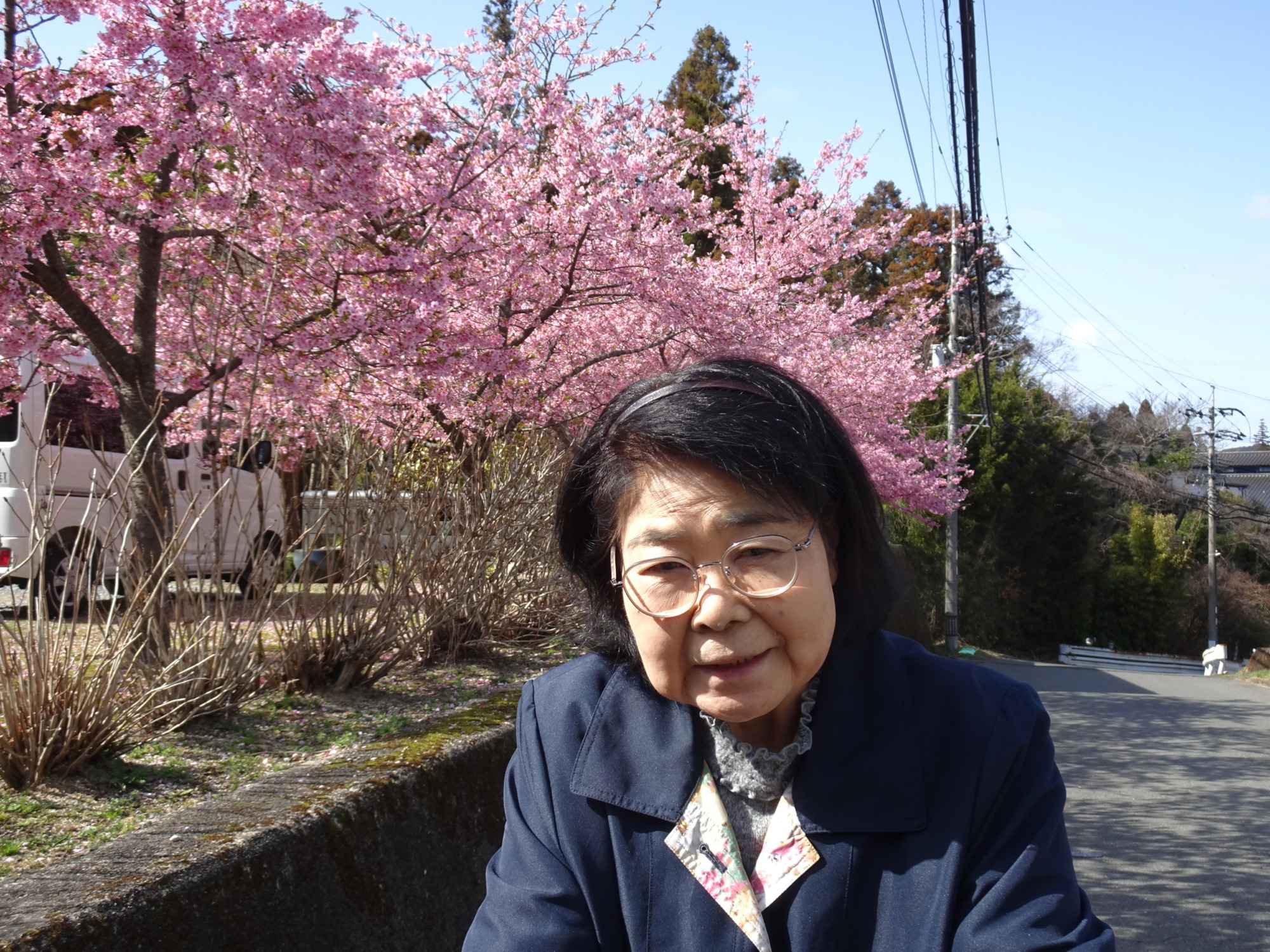 桜の前で撮った写真