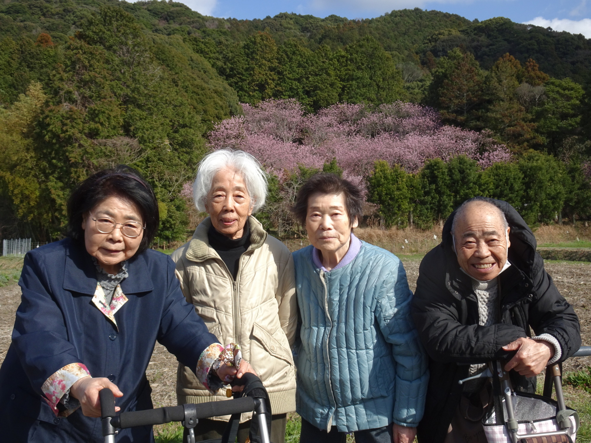 桜の前で撮った写真