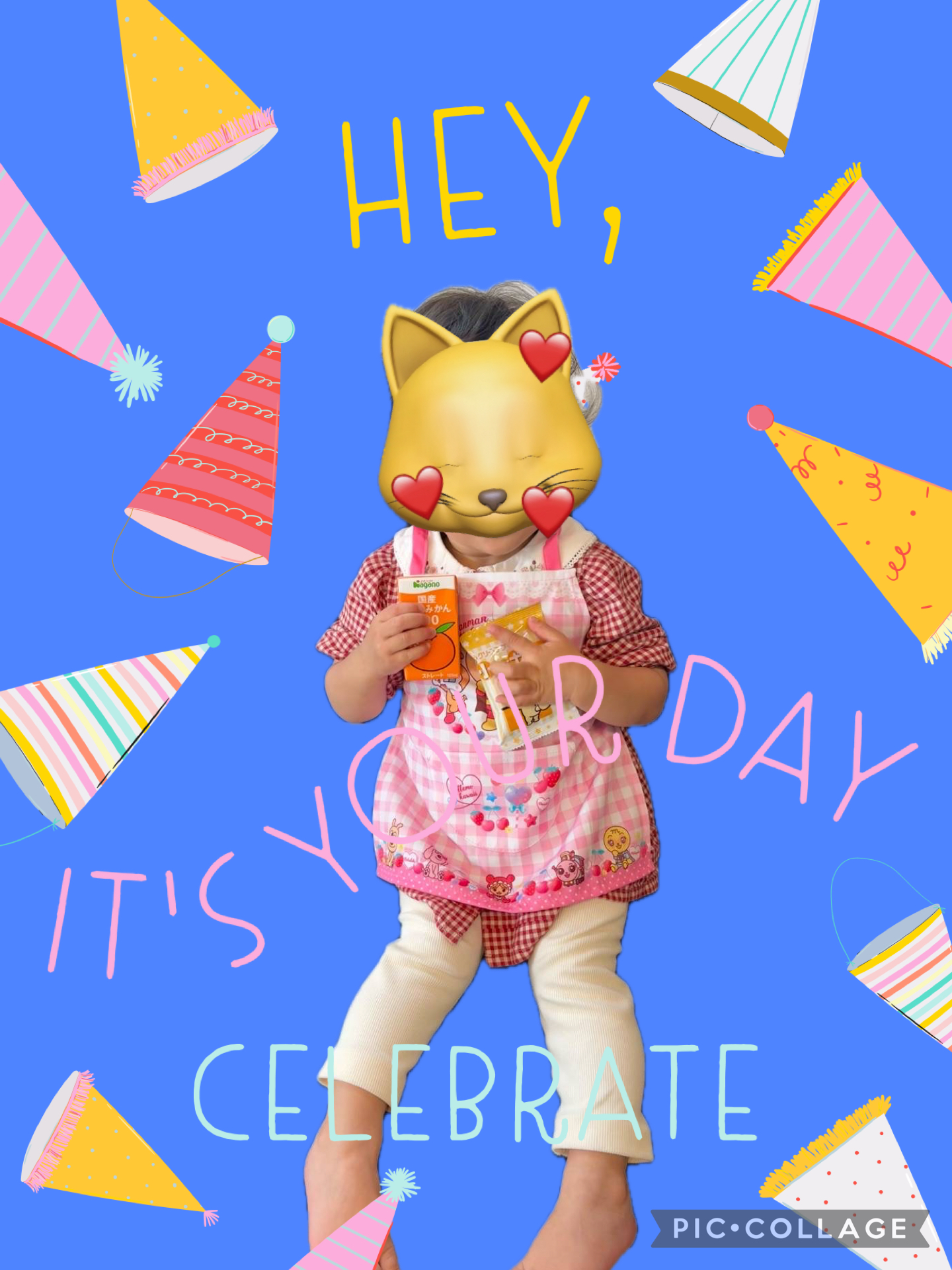 グリーンコープ商品(温州みかんジュースと小さなボーロ)を持ったお孫さんの写真