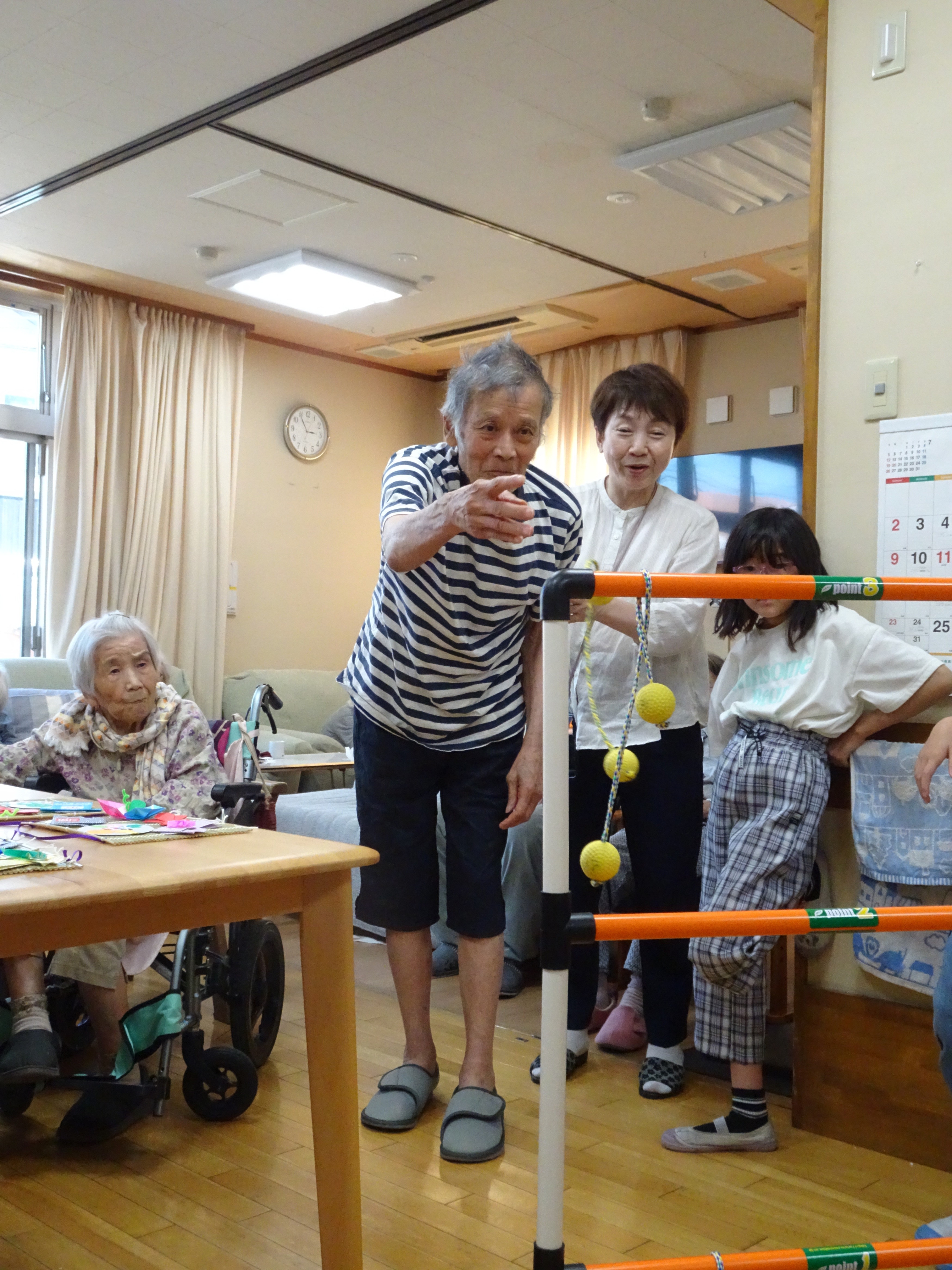 ラダーゲッターというゲームを楽しむ男性利用者さん